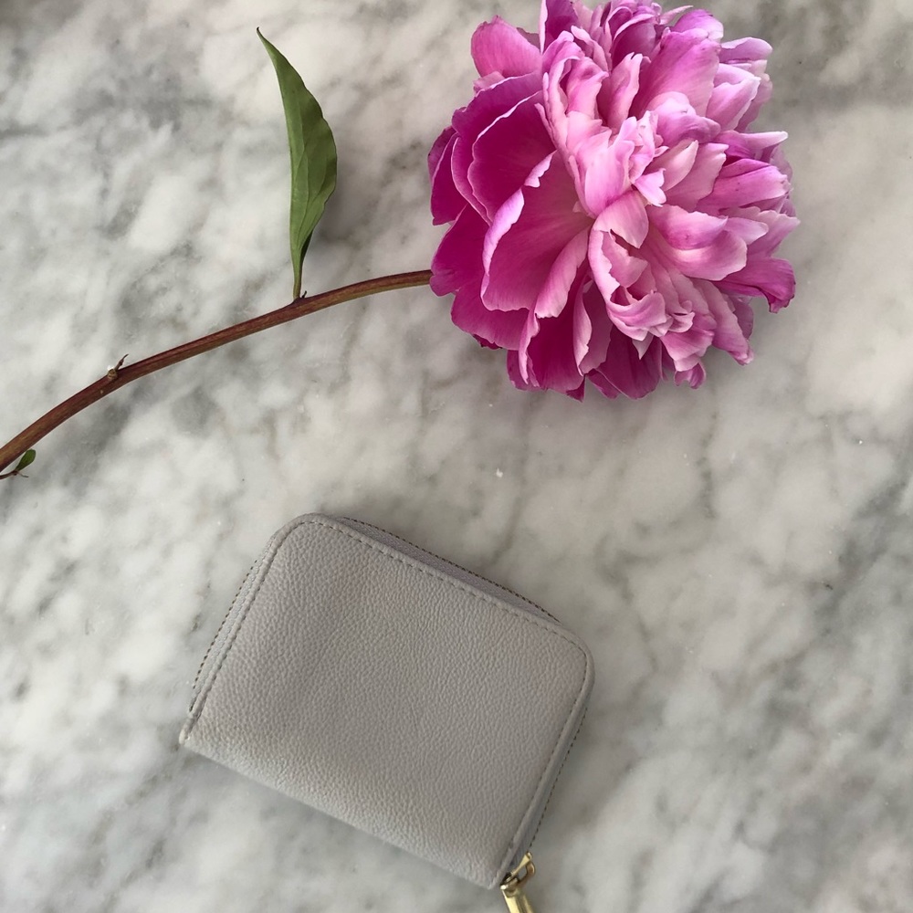 Target grey wallet with gold zipper.